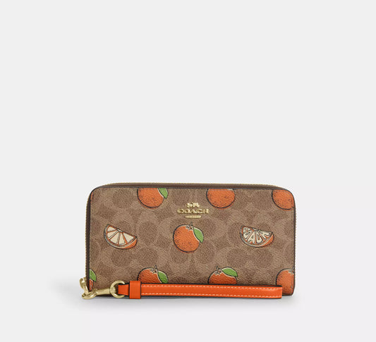 Coach - Long Zip Around Wallet In Signature Canvas With Orange Print (Preorden)
