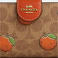 Coach - Medium Corner Zip Wallet In Signature Canvas With Orange Print (Preorden)