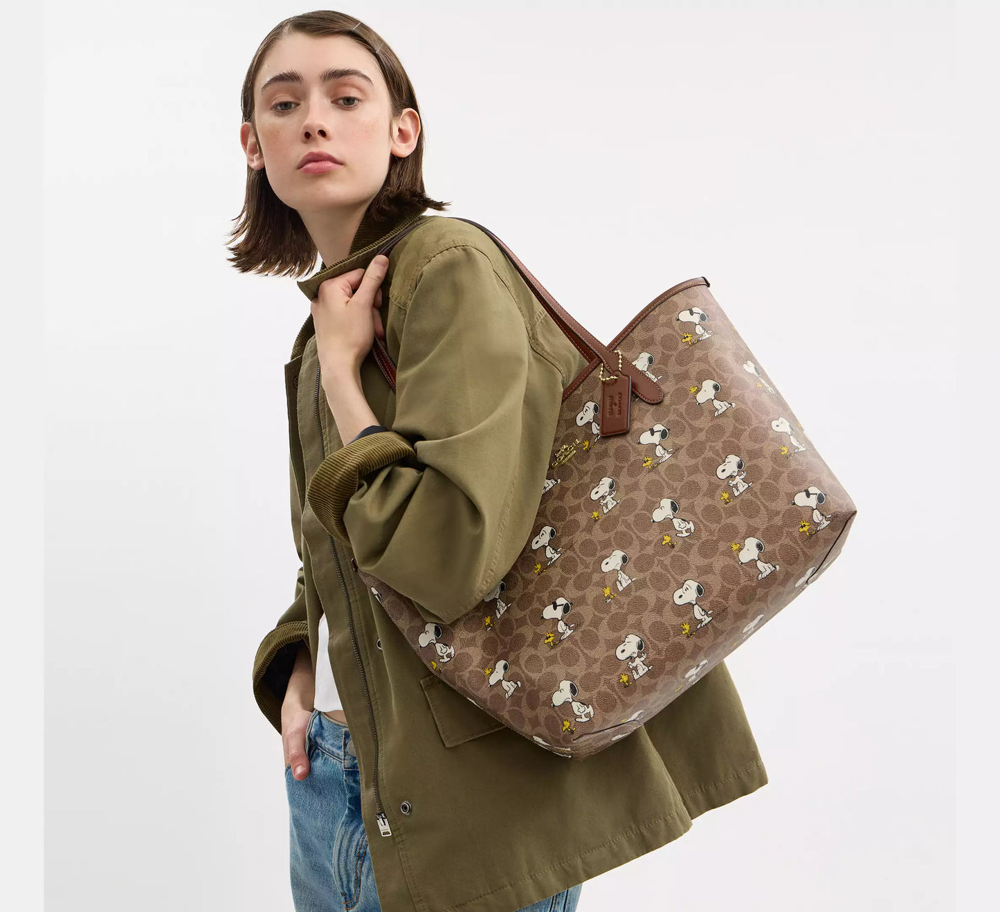 Coach X Peanuts City Tote Bag In Signature Canvas With Snoopy Print (Preorden)