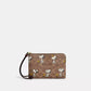 Coach X Peanuts Corner Zip Wristlet In Signature Canvas With Snoopy Print (Preorden)