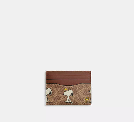 Coach X Peanuts Slim Id Card Case In Signature Canvas With Snoopy Print (Preorden)